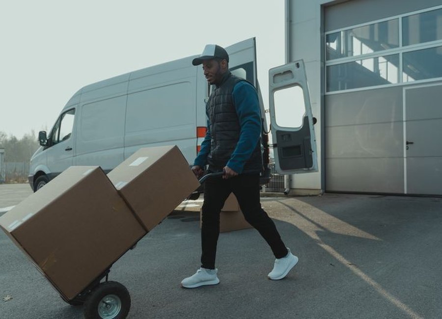 Destiny Movers truck and crew on a job in Houston